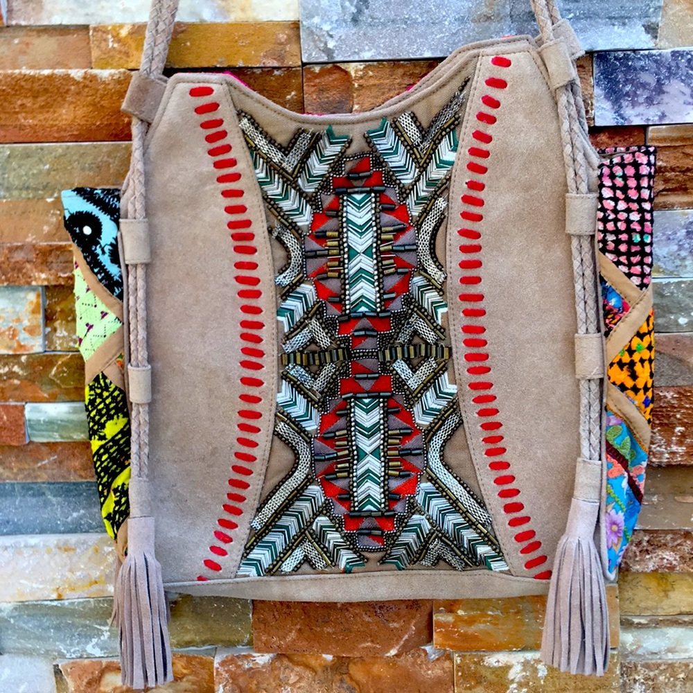 IbBan leather boho beaded shoulder tote.